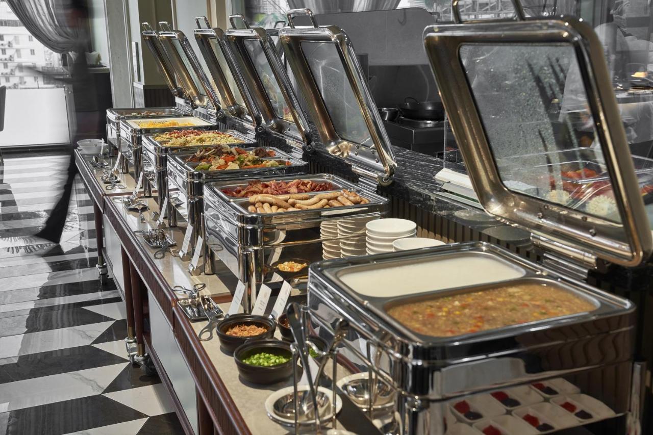 La Siesta Premium Saigon Hotel Ho Chi Minh City Exterior photo A buffet