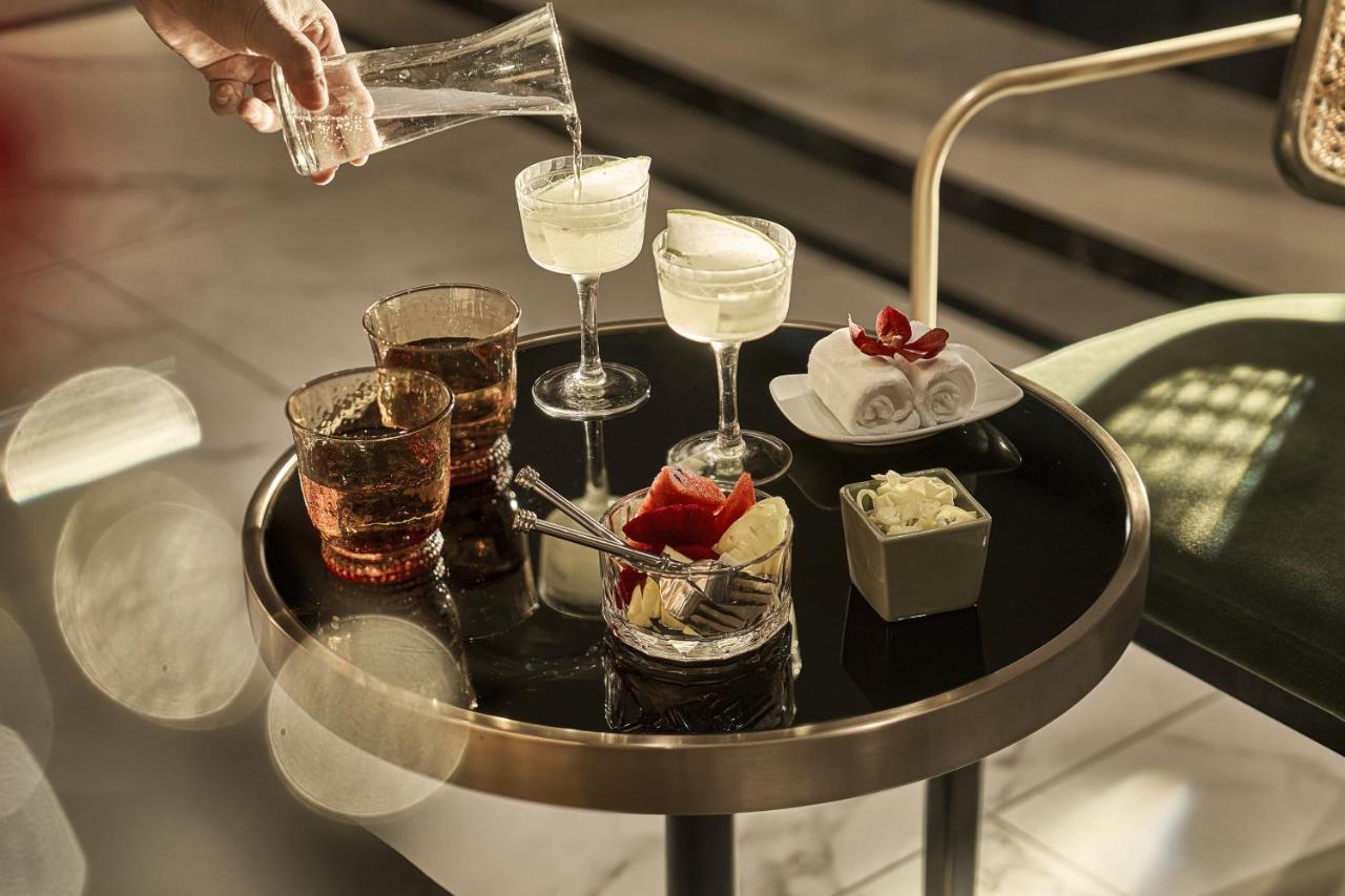 La Siesta Premium Saigon Hotel Ho Chi Minh City Exterior photo A tray of drinks
