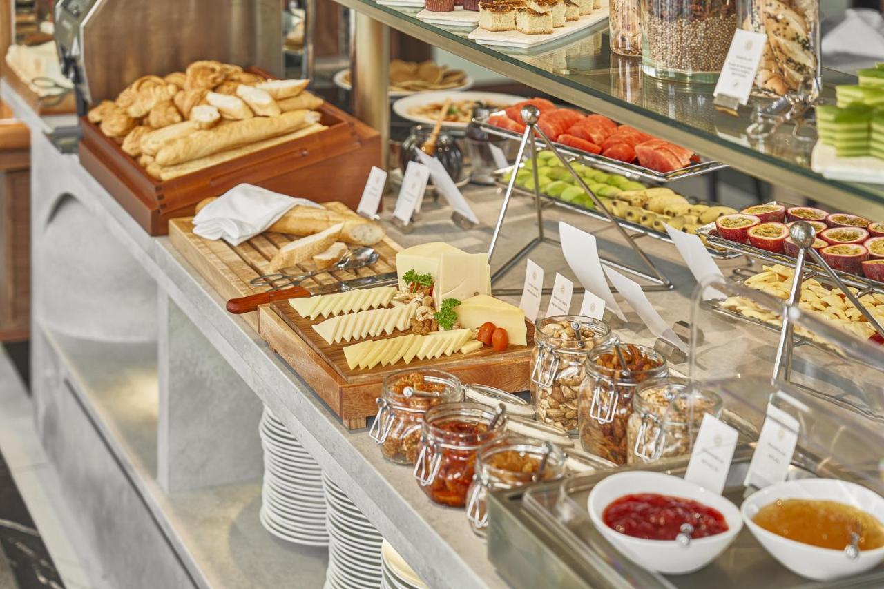 La Siesta Premium Saigon Hotel Ho Chi Minh City Exterior photo A cheese platter